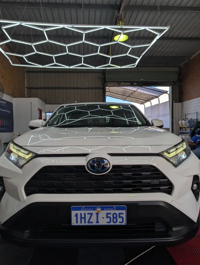 White Toyota SUV with freshly coated paintwork in the Always Detailing studio